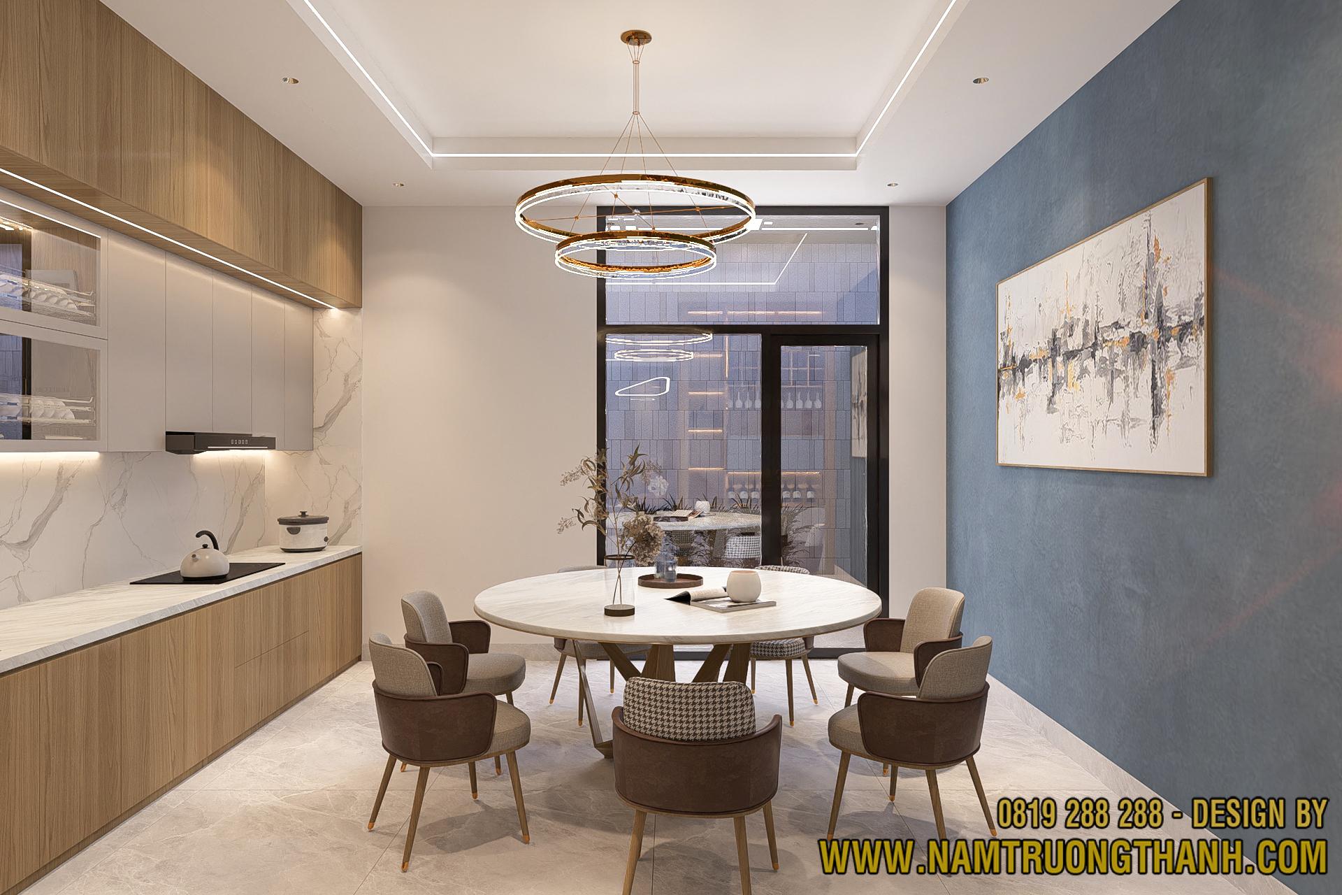 Bộ bàn ăn tròn mặt đá sang trọng trong không gian nội thất nhà phố hiện đại.