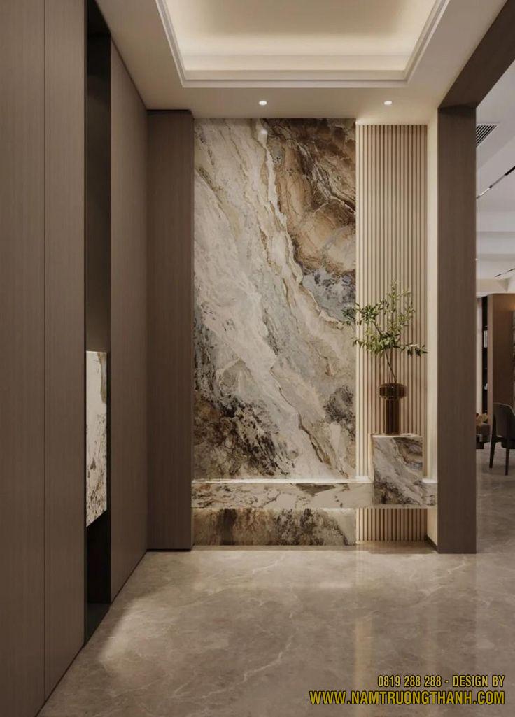 Vachs tường ốp đá marble cẩm thạch tự nhiên trang trí sảnh nhà phố sang trọng.