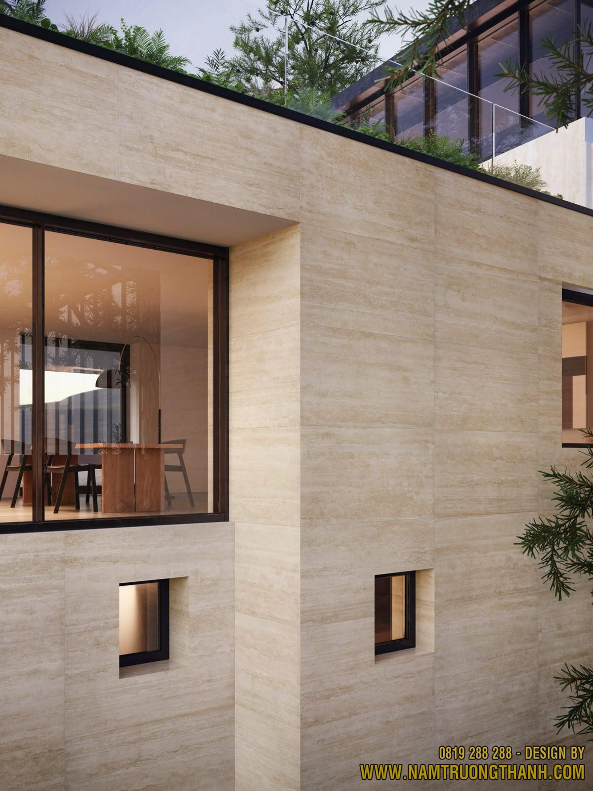 Mặt tiền nhà phố ốp đá travertine vàng kem kháng thời tiết.